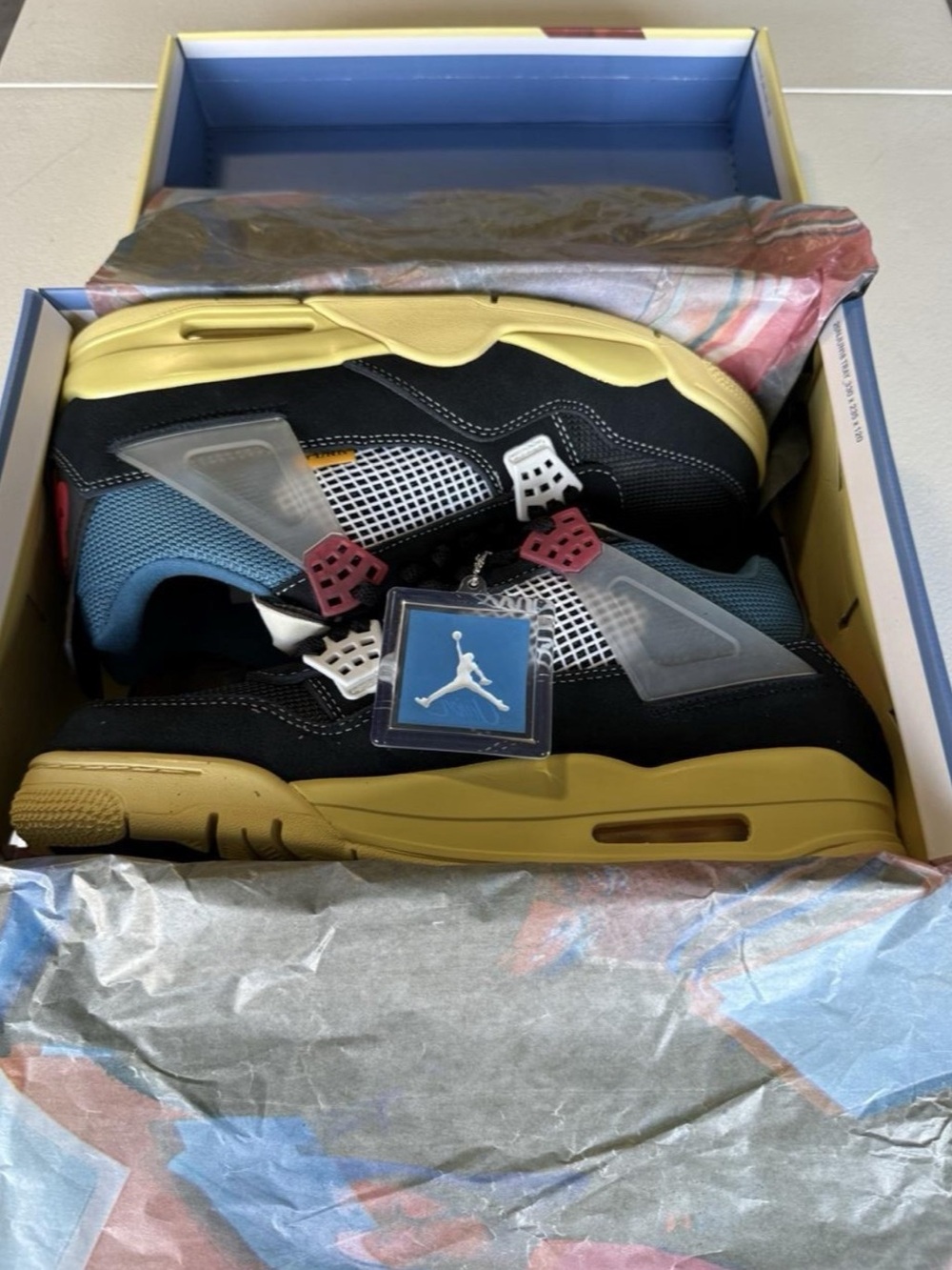 Air Jordan 4 Retro “Thunder” – Black/Yellow